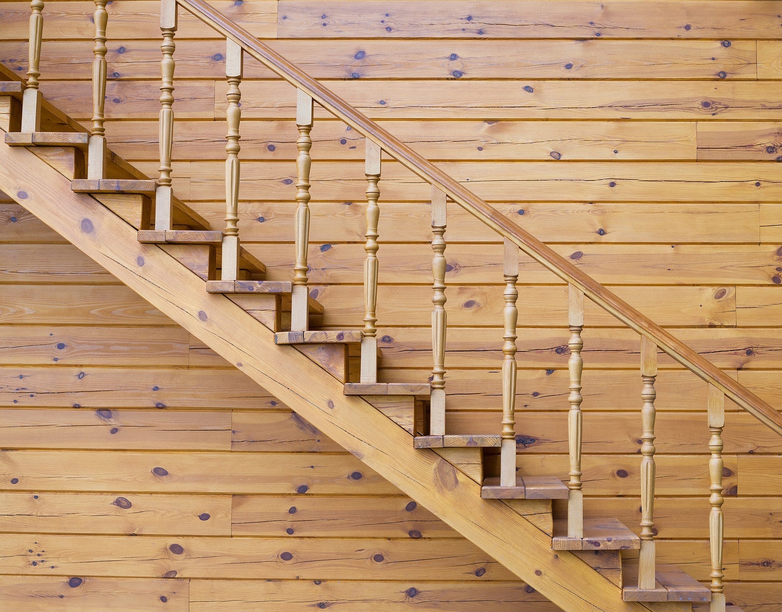 Wooden stairs in a wooden house. Architecture and design.