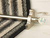 Crystal ended stair rods with chrome trim on grey fleck stair runner